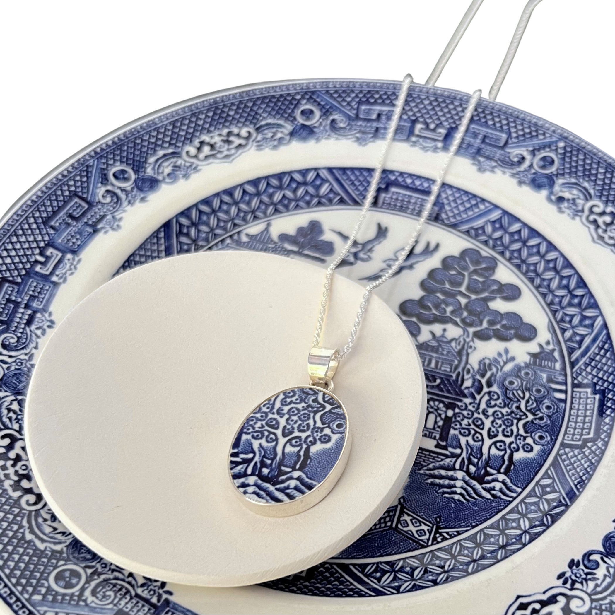 Vintage Tree of Life pendant handmade with upcycled Blue Willow china in an oval silver setting