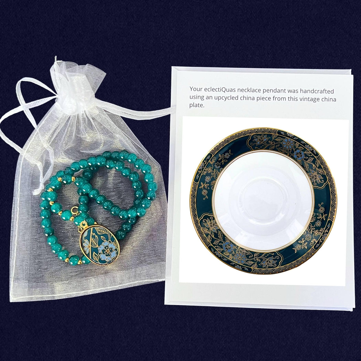 Royal Doulton Carlyle beaded necklace on a white organza jewelry bag with a photo card of the source china plate.
