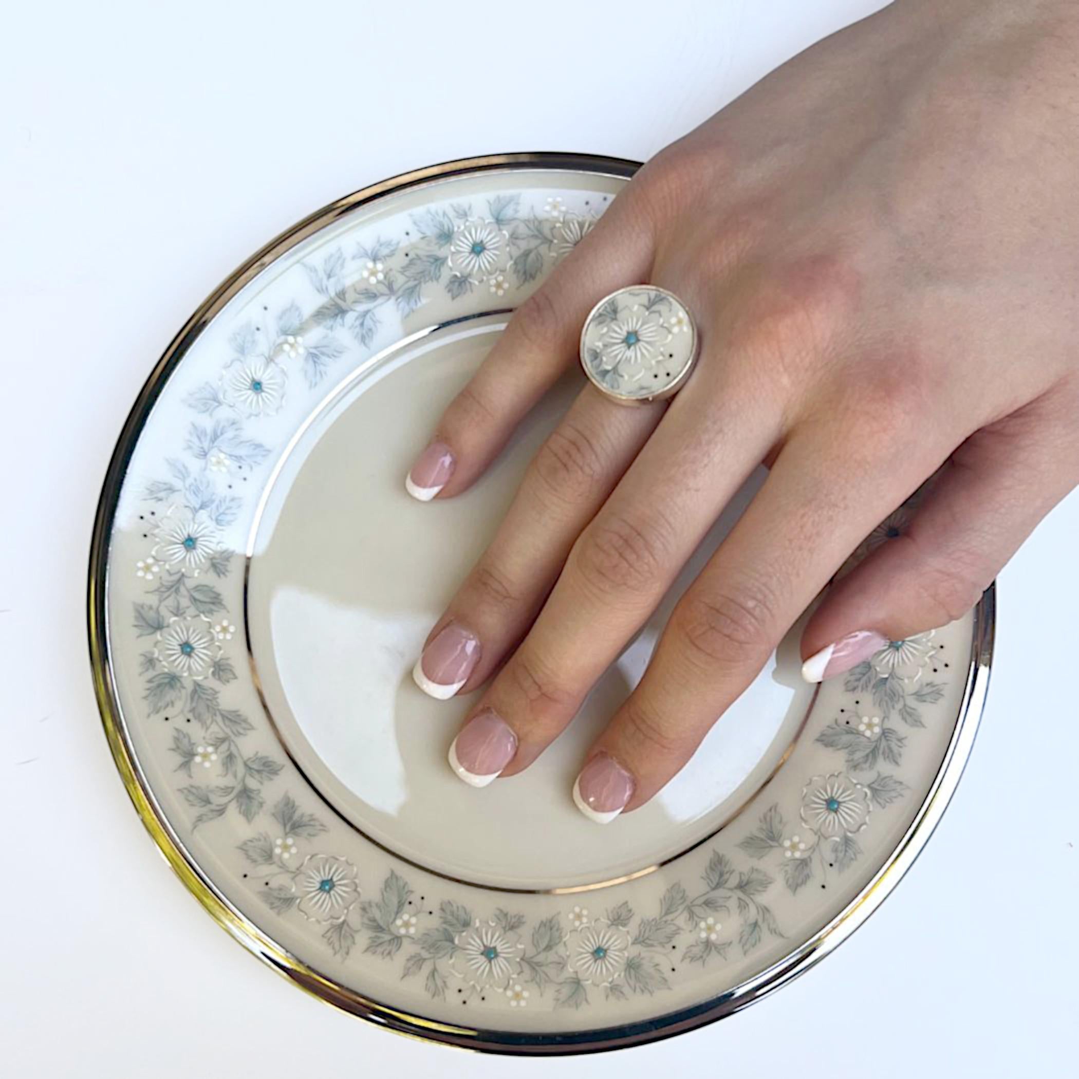 Repurposed Lenox Windsong China Ring, modeled on a young woman's hand