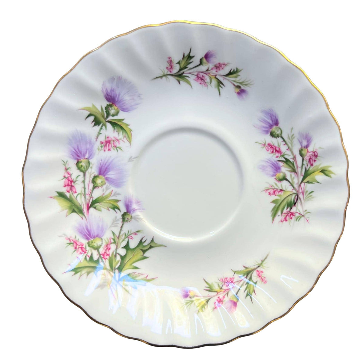 Queen Anne Lochinivar china saucer with lavender thistle pattern on white background