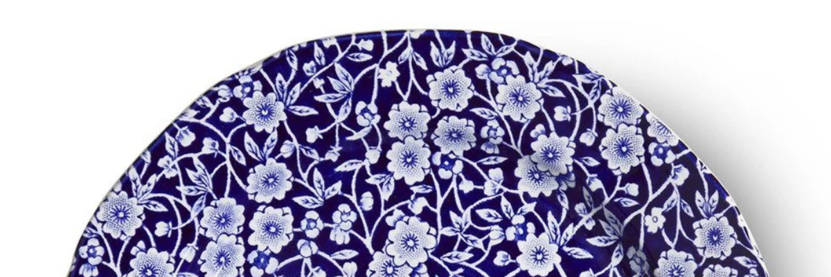 Blue Calico china plate with white floral pattern on cobalt blue ground by Burleigh Pottery