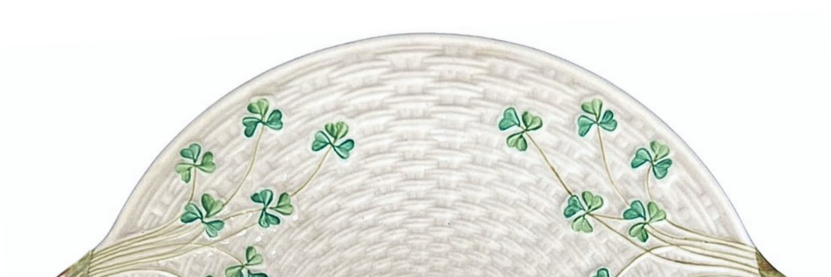 Belleek Shamrock cake plate showcasing Ireland's iconic three-leaf clover design and signature cream finish. A beautiful example of Parian porcelain. 