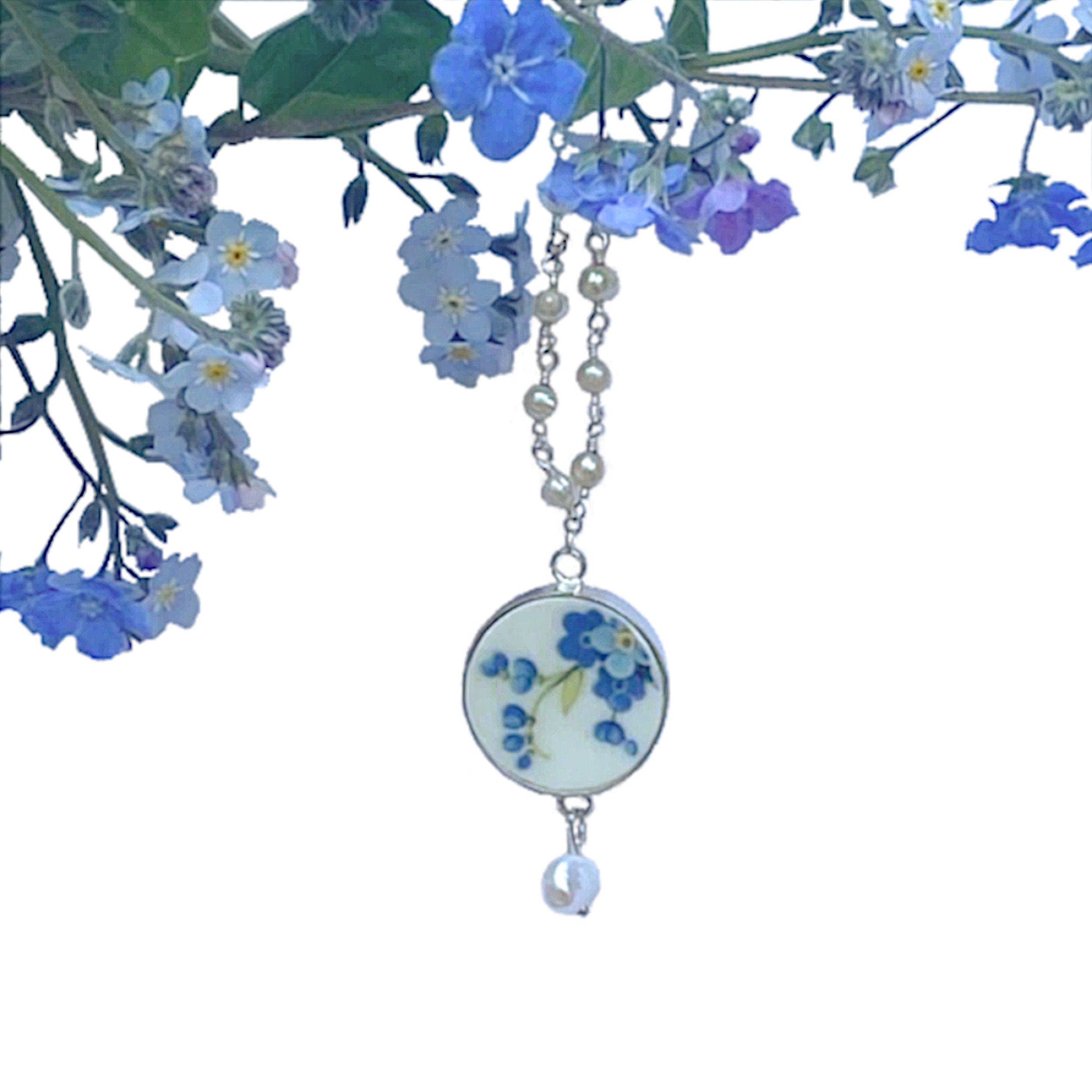 Forget Me Not Broken China Necklace, featuring an 18in tiny pearl rosary chain made with freshwater pearls and sterling silver, a sterling silver setting, and a repurposed china piece from a vintage Staffordshire Majestic Choice china plate.