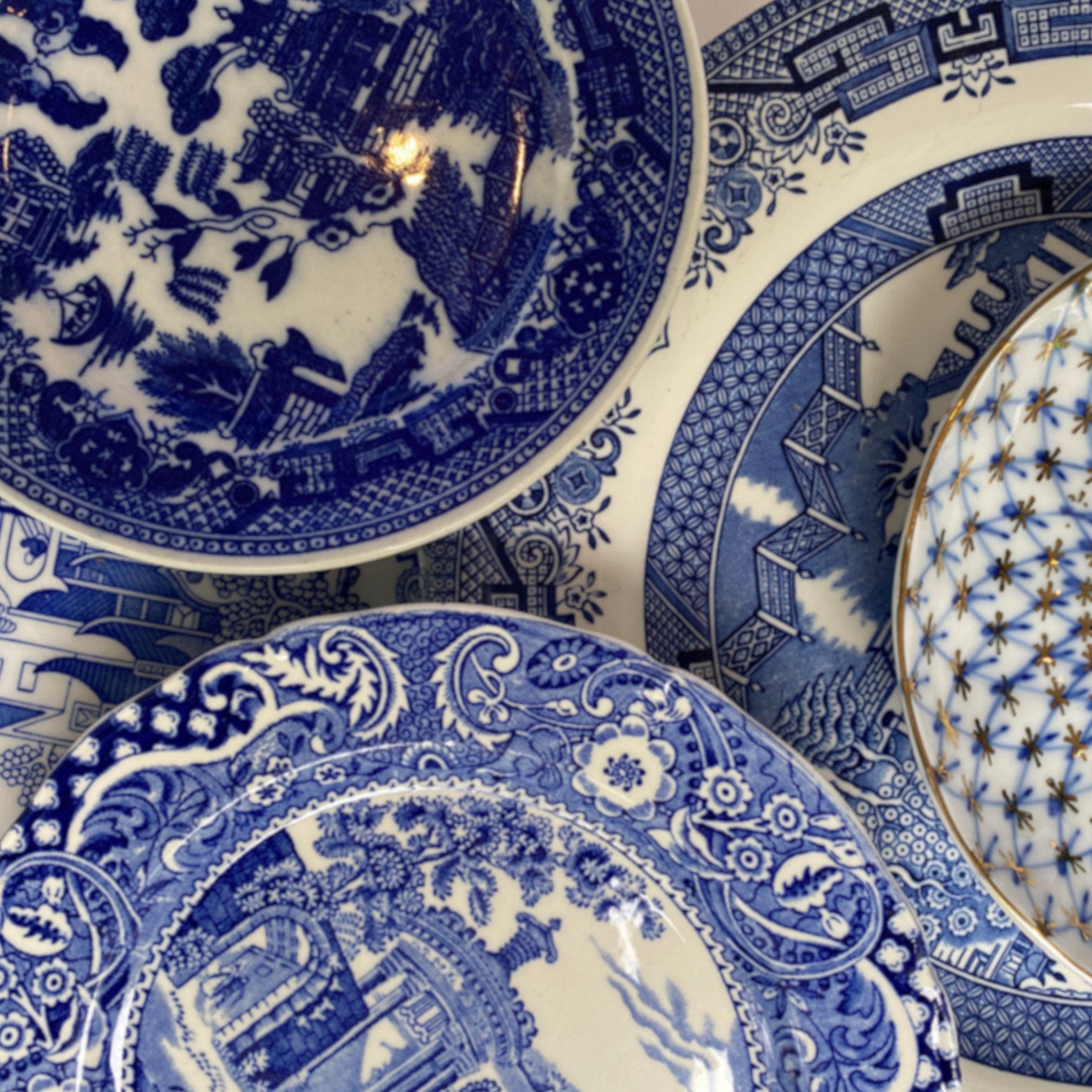 Photo featuring the beautiful Blue Willow and Blue & White vintage porcelain and antique bone china plates used in eclectiQuas broken china jewelry.