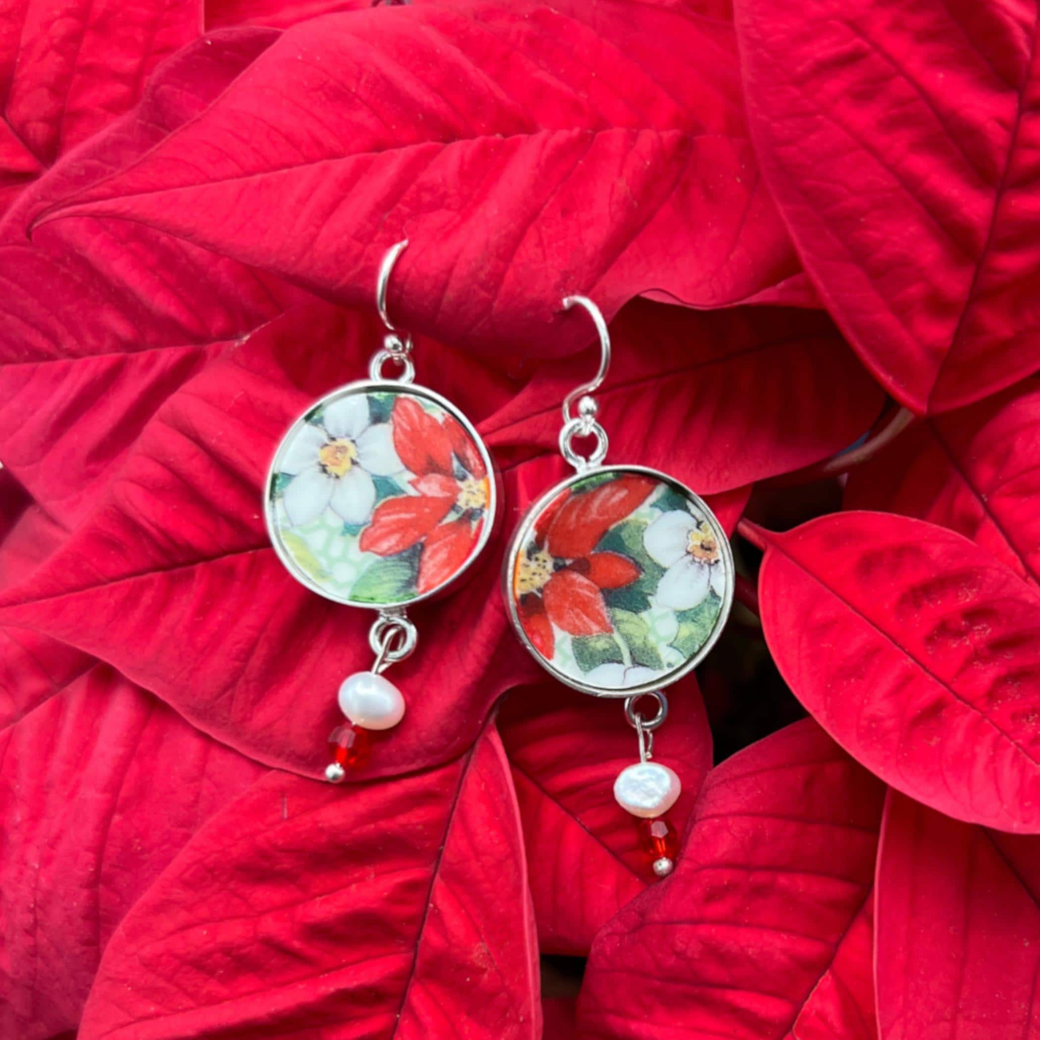 Unique Christmas gift earrings featuring broken china jewelry with red poinsettia pattern and pearl dangles