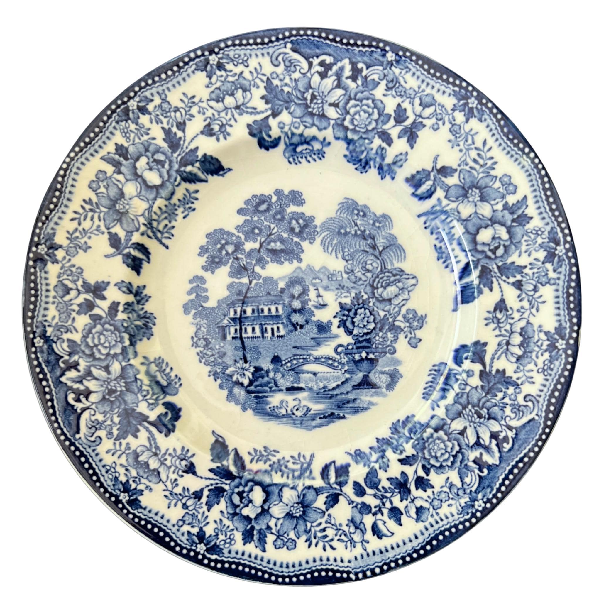 Vintage Staffordshire blue and white china plate, the source pattern for this necklace and earrings.