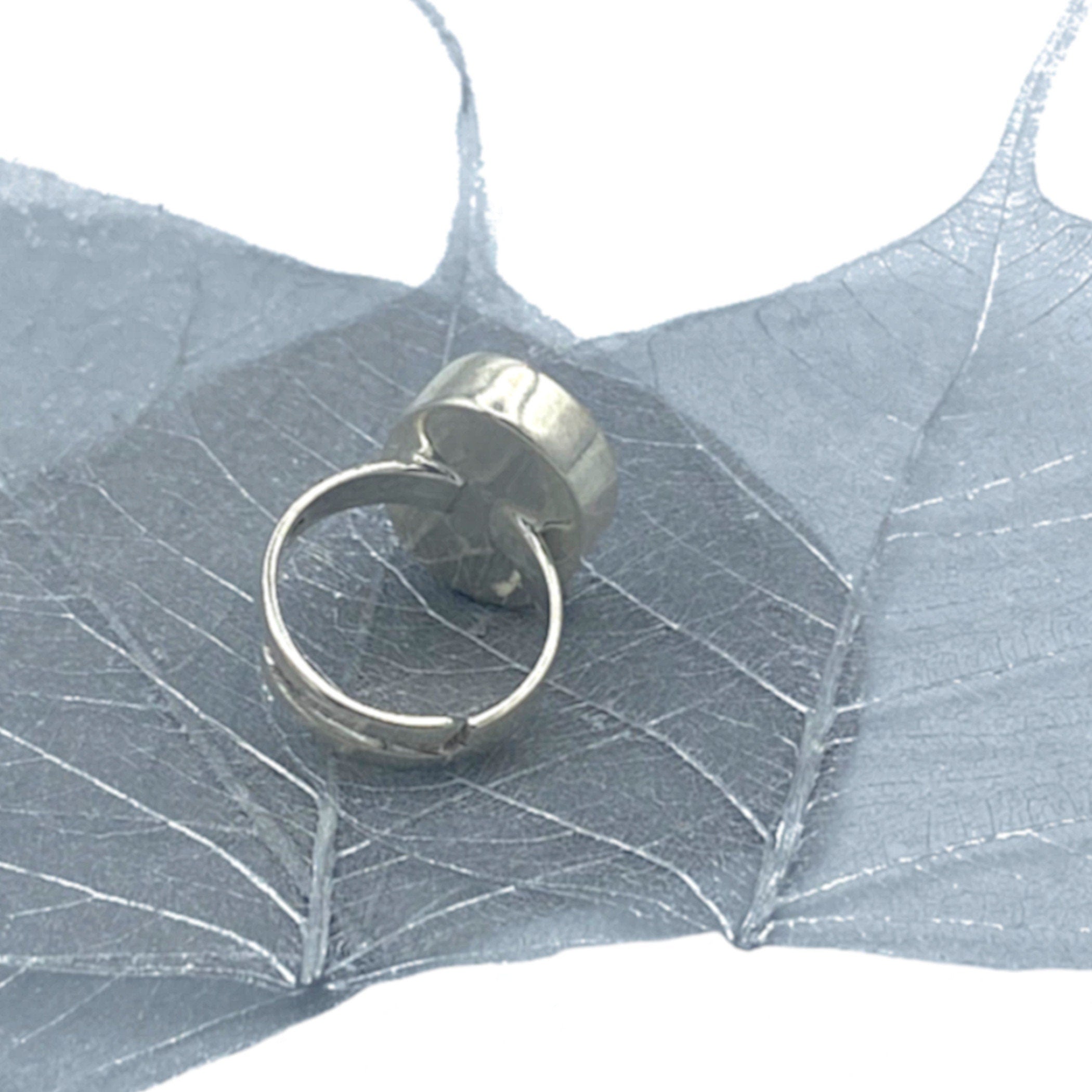 Back view of an eclectiQuas sterling silver oval adjustable ring