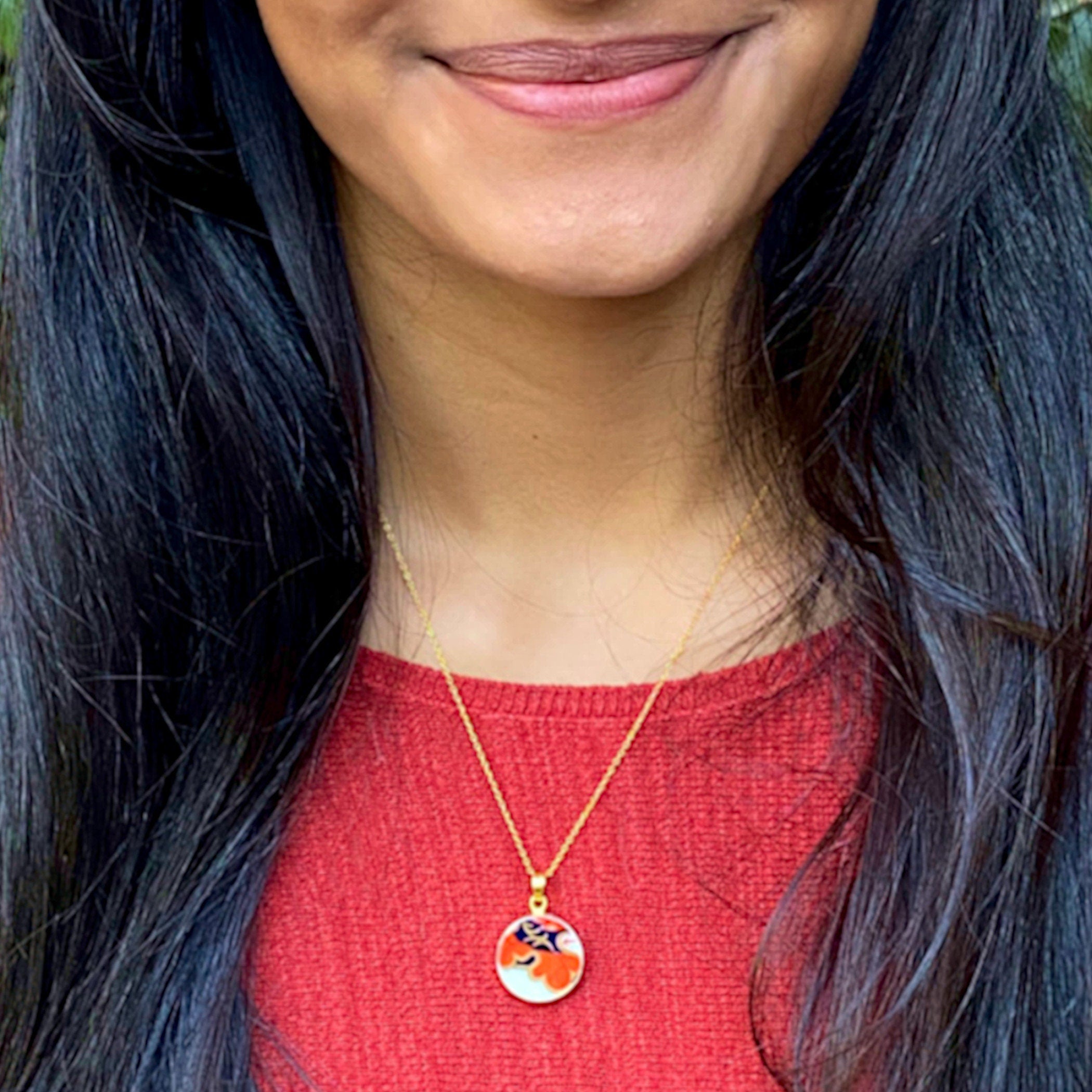 Model wearing this Royal Crown Derby Imari Broken China Necklace with fine gold plated sterling silver chain and broken china pendant.