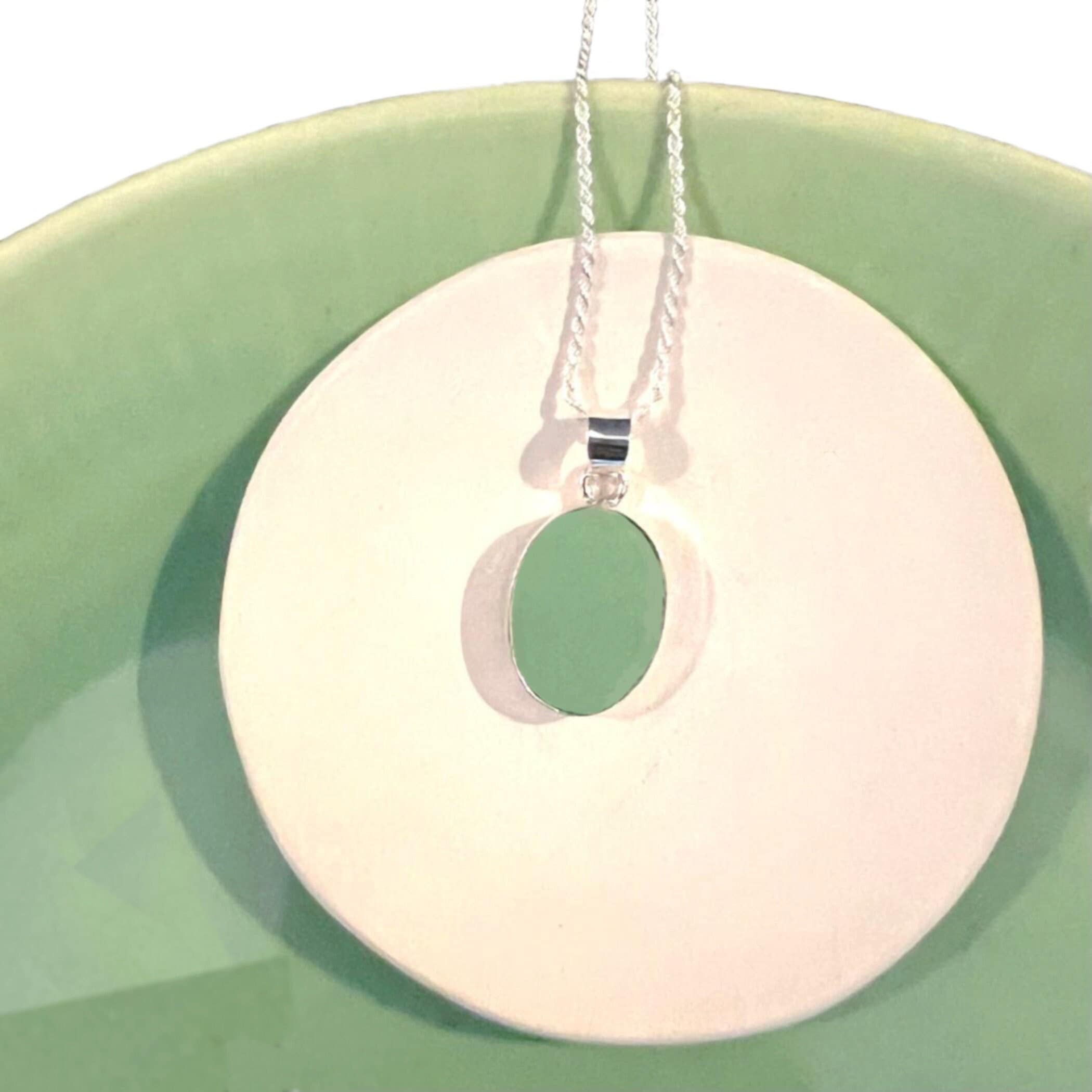 Celadon Porcelain Necklace featuring a Broken China Pendant handmade with Upcycled Celadon Pottery & Small Oval Sterling Silver Setting